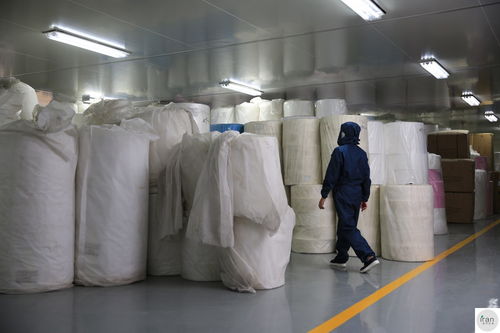 实拍防雾霾口罩工厂 防护严密如医院隔离区